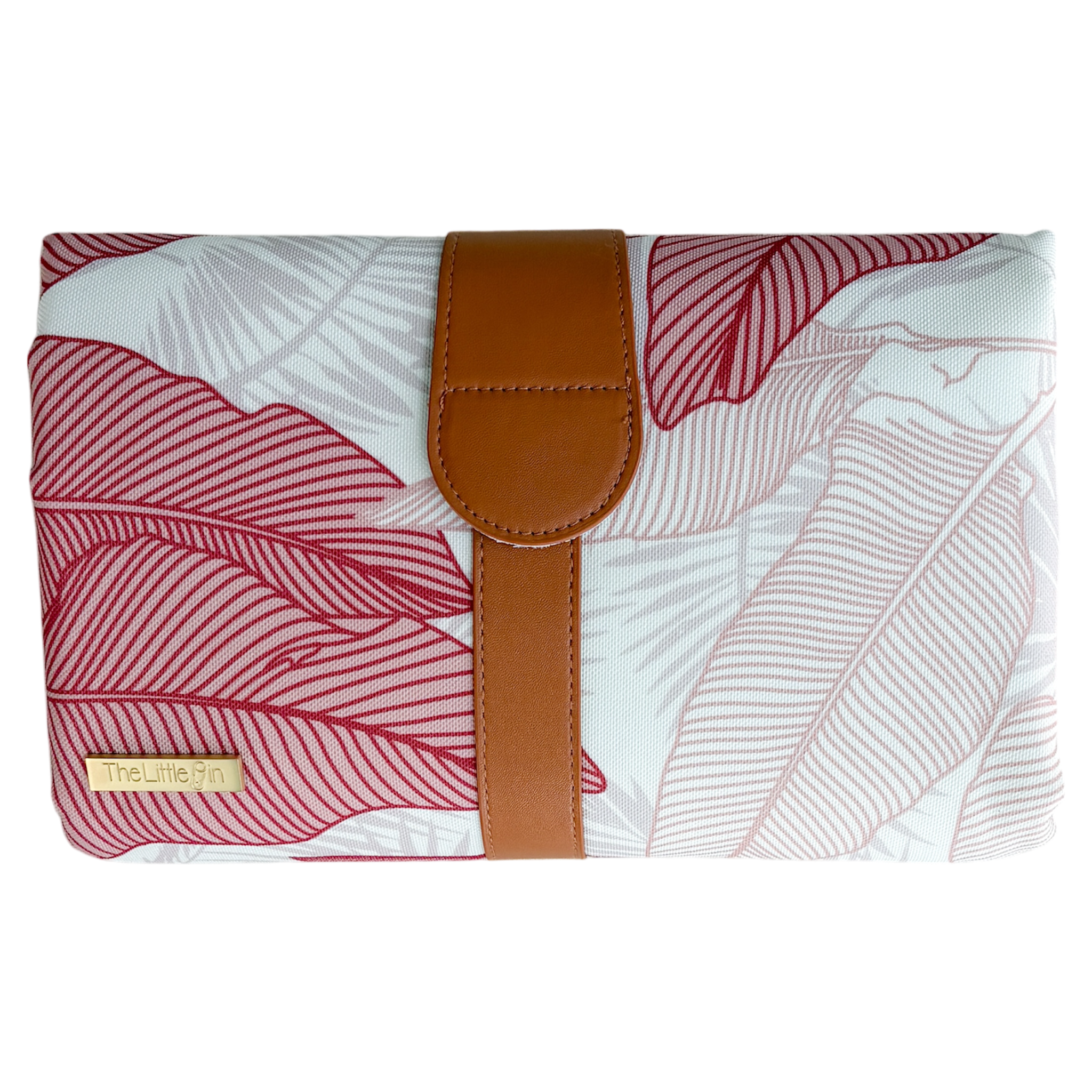 Baby change mat with leaf pattern and brown strap on a white background